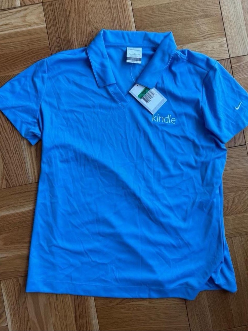 NWT Nike Women’s Bright Blue Golf Polo with Kindle Logo